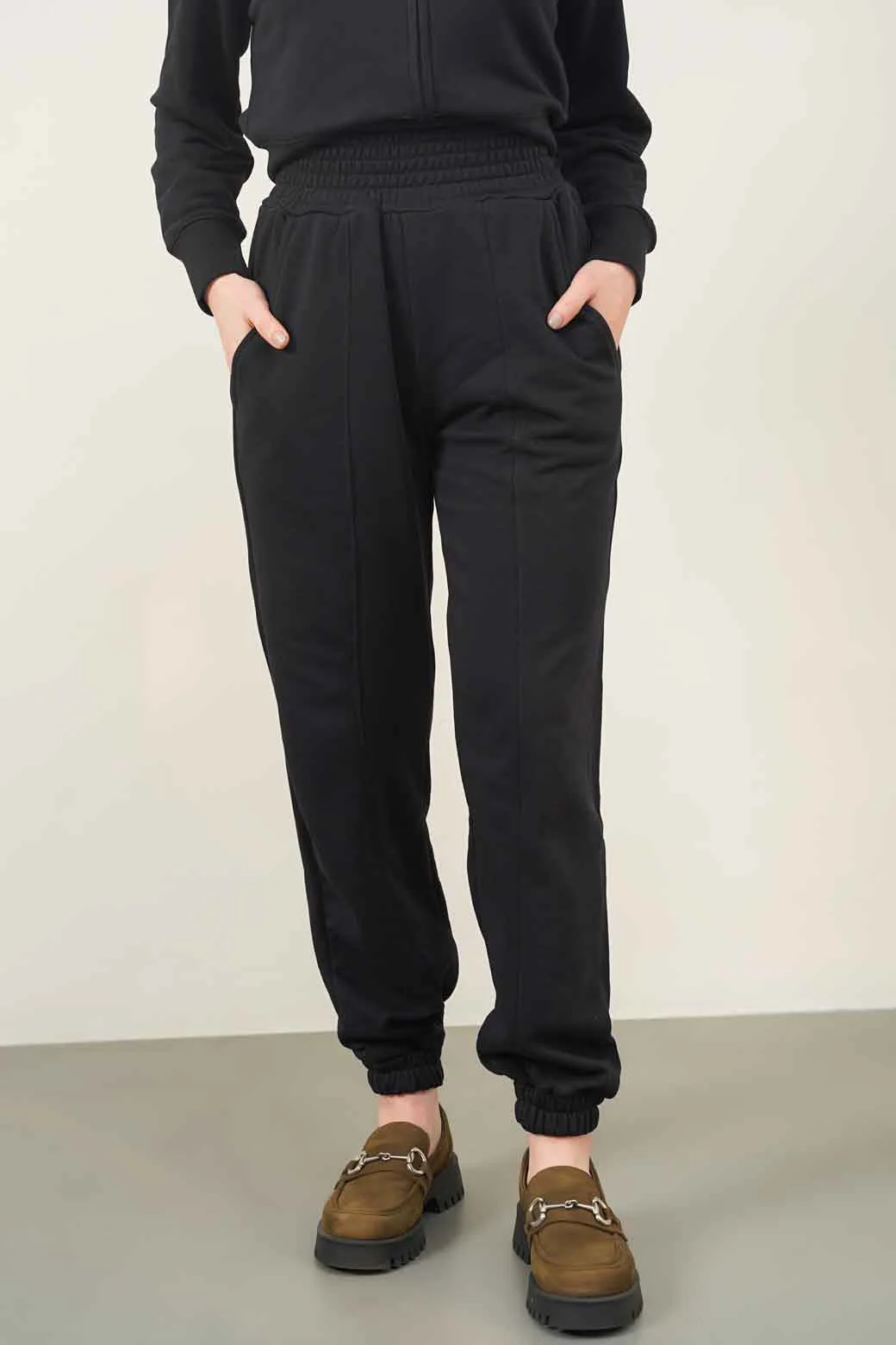 TROUSERS WITH ELASTICATED HEM